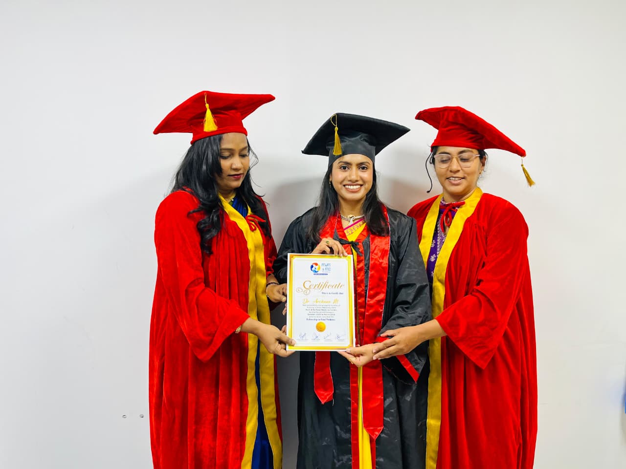 Mom & Me fellowship graduate receiving certificate with mentors